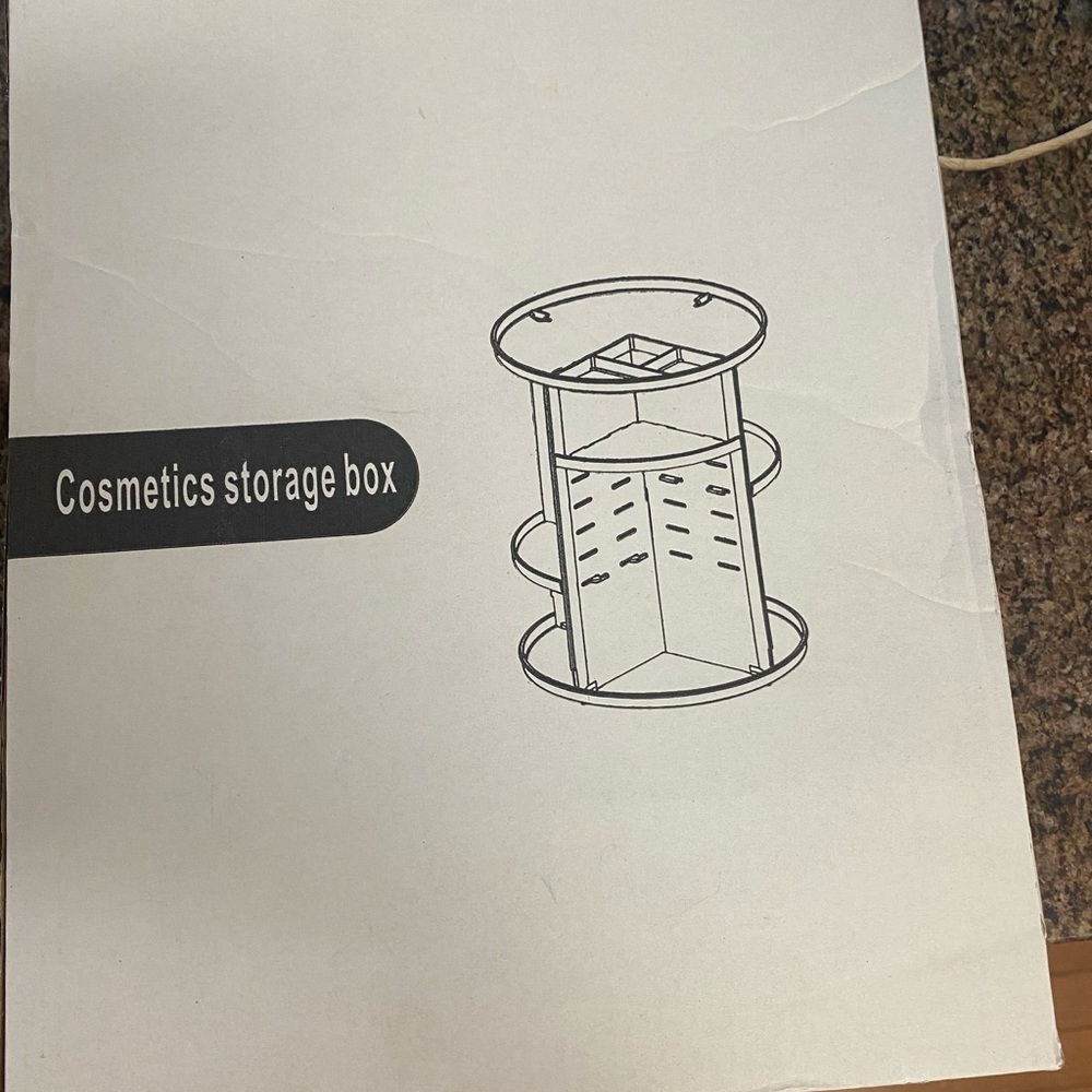 Rotating makeup storage tier NIB